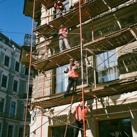 Men on Brown Scaffolding